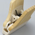 A bamboo clip featuring a natural beige and light brown design with a visible spring mechanism.