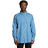 A blue denim button-up shirt with long sleeves and a chest pocket, featuring a subtle logo.