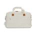 A cream duffle bag with tan accents, featuring a zippered front pocket and sturdy handles.
