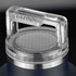 A drink bottle featuring a stainless steel base and a clear, hexagonal-patterned lid with a handle.