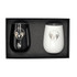 A drink set featuring two insulated tumblers, one black and one white, in a gift box with a logo.