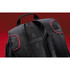 A black backpack featuring red accents and a branded logo on the back panel.