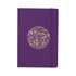 A purple bound journal featuring a decorative circular design and an elastic band closure.