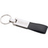 A silver key ring with a black faux leather strap and a logo on the metal part.