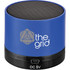 A blue cylinder Bluetooth speaker with a mesh top and a logo on the side. The base features a charging port.