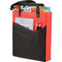 A red and black non-woven tote bag with various items, including magazines and pens, visible inside. It has a logo.