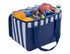 A navy striped cooler bag filled with water bottles, an apple, oranges, and soft drinks, featuring sturdy handles.