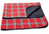 A red check picnic rug with a black underside and a folded corner, featuring a plaid pattern.