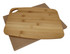 A bamboo cheese board with a smooth, natural finish resting on a cardboard base.