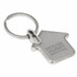 A silver house-shaped keyring with a metal loop and a logo.