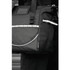 A black cooler bag features reflective detailing and multiple pockets, designed for carrying items securely. It has a logo.