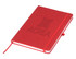 A red A5 notebook featuring a logo on the front and an elastic band closure.