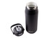 A drink bottle in matte black with a stainless steel interior and a quick release lid. The lid features a handle and a spout, and includes branding.