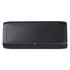 A black outdoor speaker and wireless power bank with a textured front surface and rounded edges. It features a logo.