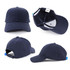 A navy blue cap featuring a structured design and an adjustable strap, with an internal logo.
