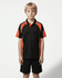 A child wearing a black polo shirt with orange accents, paired with black shorts, standing against a plain background.