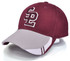 A maroon and grey cap with a logo on the front and contrasting side panels.