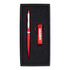 A drink bottle opener keyring and a red pen, both presented in a black gift box with foam insert.