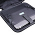 A sleek black wheeled bag with a padded compartment and adjustable straps for securing a laptop inside.