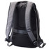 A grey backpack with padded straps and a textured back. It features a logo and anti-theft design.