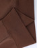 A close-up of the cuff detail on a brown unisex premium fleece oversized hoodie. The fabric is soft and ribbed.