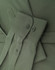A close-up of a men's smart casual cotton blend long-sleeve shirt in olive green, featuring button details and cuffs.