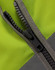 A close-up of a zip on a high visibility safety vest in bright yellow and grey. The vest features utility pockets.