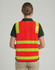 A high-visibility orange road safety vest with reflective yellow stripes, featuring a logo on the back.