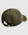 An olive green washed baseball cap featuring a logo and an adjustable strap at the back.