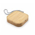 A square wireless charger made of bamboo with a grey fabric cord, featuring a modern design and a logo.