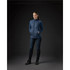 A women's boulder thermal shell jacket in dark blue with a quilted design and pockets, displayed against a dark background.