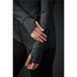A close-up of a women's Pacifica jacket in dark grey, showcasing the fitted sleeves and a logo.