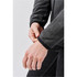 A men's full zip jacket in grey, featuring sleeves being adjusted at the cuffs. The jacket has a logo.