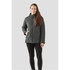 A woman wearing a dark grey women's thermal shell jacket, featuring a hood and a sleek design.