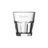 A whisky tumbler made of clear glass, featuring a ridged design and a logo on the side.
