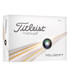 A box of Titleist Velocity golf balls, featuring a white background with silver and gold accents, includes a logo.