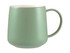 A green ceramic coffee mug with a smooth matte finish and a comfortable handle. Features a logo on the side.