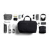 A black duffel bag surrounded by a water bottle, shoes, a hoodie, headphones, sunglasses, and various accessories.