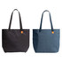 A black and a blue tote bag are displayed side by side, each featuring a small logo.