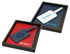 A travel journal set featuring a navy blue and white cover, presented in a black box with red and blue interior.