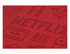 A red notebook cover features debossed design elements related to film and streaming. It includes a branding logo.