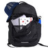 A black backpack with a blue cap, containing a laptop, notebook, and drink bottle visible inside.