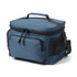 A blue lunch cooler with a zipped compartment, exterior pockets, a handle, and a shoulder strap. It features a logo.