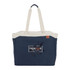 A navy blue tote bag with cream handles and a branding logo featuring a leaf design on the front.