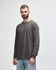 A grey long sleeve t-shirt designed for adults, featuring a crew neck and a simple, unadorned style.