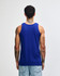 A blue unisex fine jersey tank top with a casual fit, featuring a logo on the back.