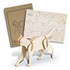 A wooden model of a cat in a natural finish, accompanied by a diagram sheet for assembly.
