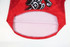 A red hockey jersey featuring a graphic design and a visible interior lining, with a logo present.