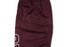 A pair of maroon ice hockey socks featuring a textured design and a logo.