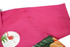 A vibrant pink sports jersey featuring a flamingo graphic and tropical foliage design. It has a logo on the fabric.